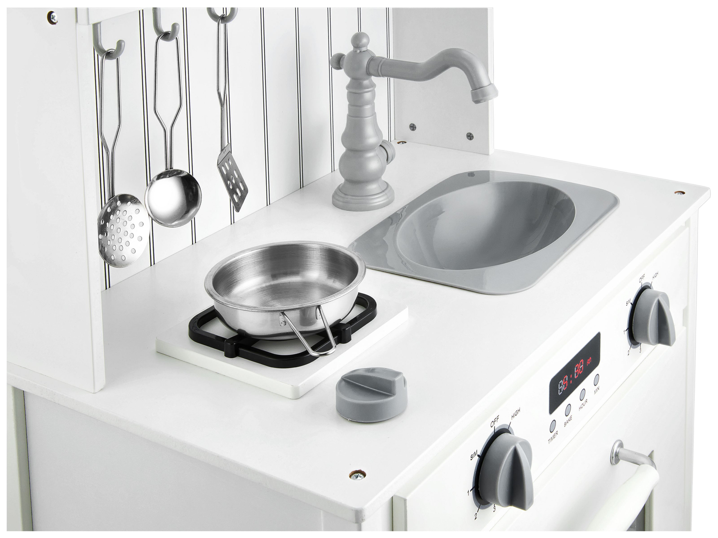 Vitt träkök med förkläde, tillbehör och LED-lampa