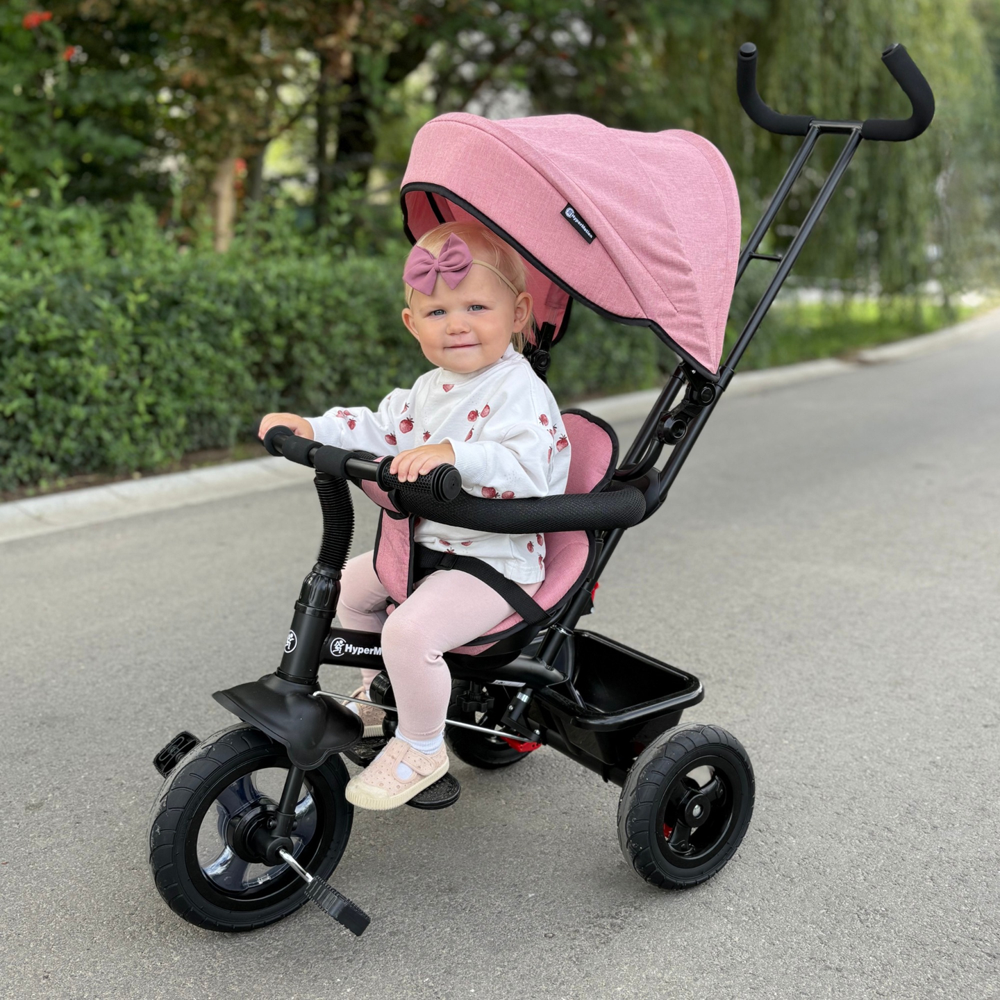 Trehjuling för barn 1-4 år - TOBI FREY - rosa färg - svängbar - pumpade hjul + tryckare