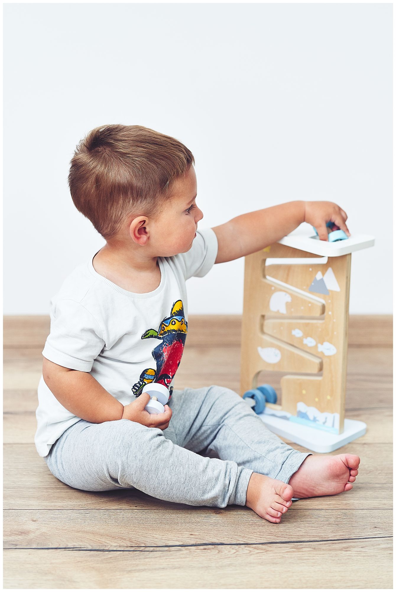 Trä med dubbelsidig sensorisk manipuleringsbräda